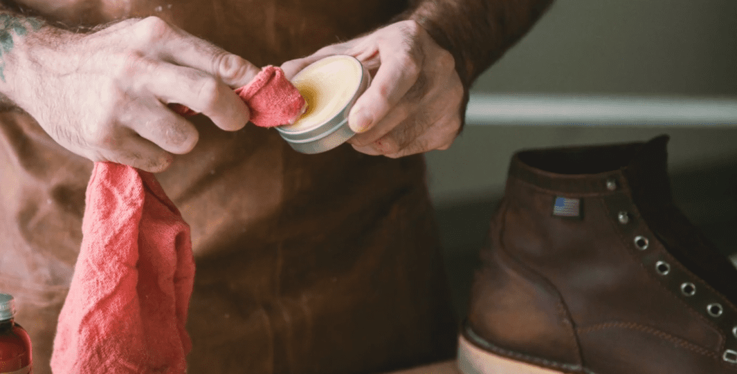 applying dubbin to boots