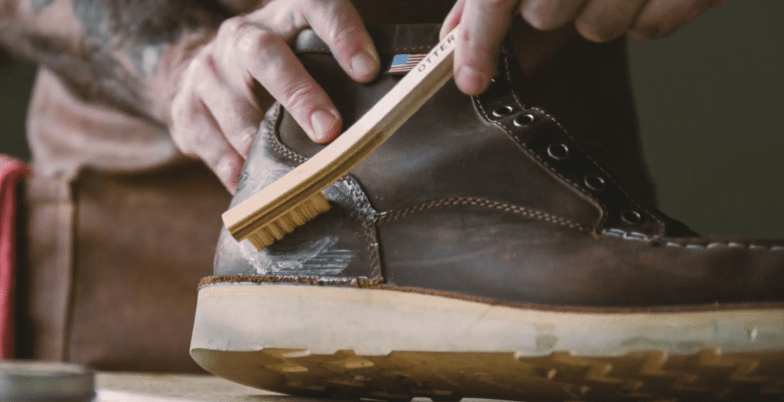 applying dubbin to boots